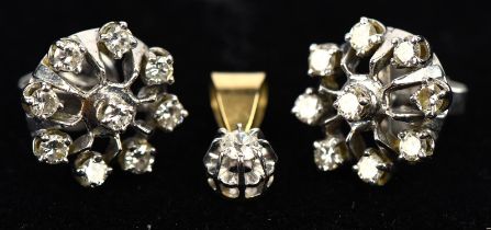 A pair of diamond cluster earrings, set with round cut diamonds, with post and butterfly fittings,