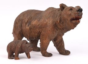 A South German carved standing bear with associated cub, 1st quarter 20th century,