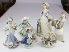Lladro, a group of four figures of girls with flower basket's, with various animals,