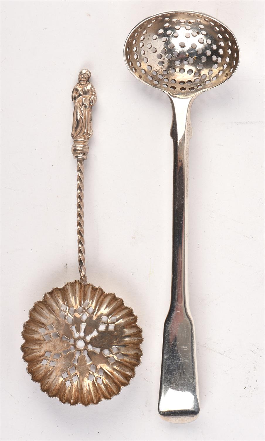 Georgian silver sifter ladle spoon. London, 1807 and an Apostle silver softer caddy spoon.