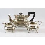 A Victorian silver tea set, Sheffield, 1922, by Cooper Brothers & Sons Ltd, with a scalloped edge