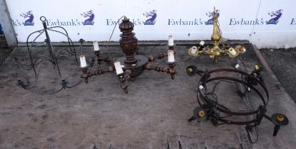 A large Baroque style stained beechwood hanging light, with six turned candlearms,