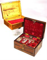 A Victorian rosewood dressing box, inlaid with stringing and with side handles and lateral drawer,