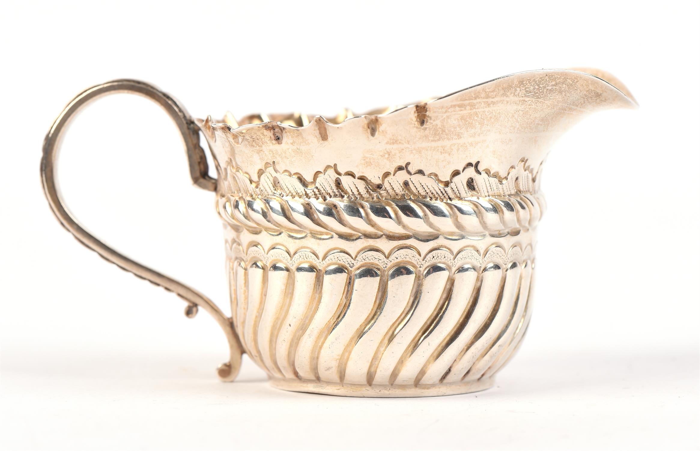 Silver cream jug with demi fluted embossed design. Birmingham, 1890. - Image 2 of 3