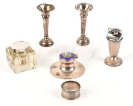 Silver and enamel inkwell, another with silver top, a silver bodied table lighter and other pieces