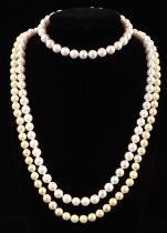 A pearl necklace, with cream pearls measuring approximately 5.75mm, with a 14 ct pearl clasp,