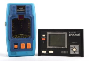 2 unboxed Retro Gaming handelds from the 1980s Includes: Bandai Missile Invader (1980) and Bandai