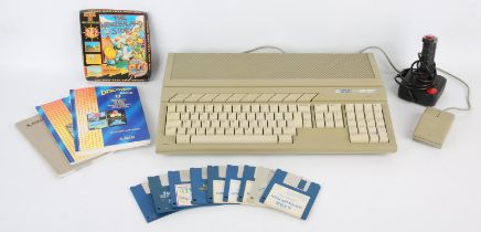 Atari ST personal computer with a boxed copy of The New Zealand Story and a selection of loose