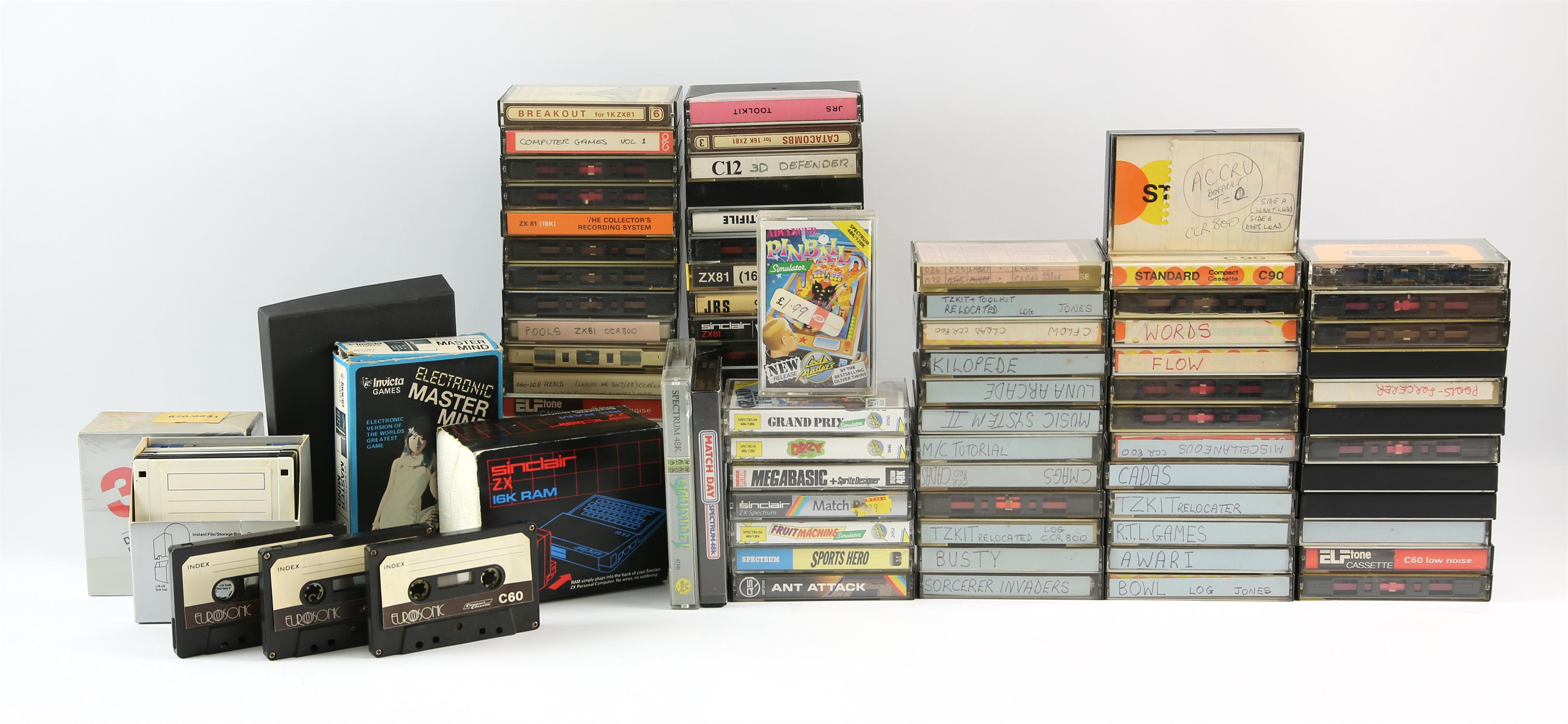 A large assortment of 80s/90s game cassettes and accessories Highlights include: Sinclair ZX 16K