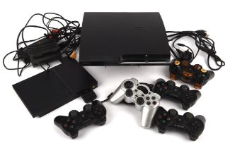 PlayStation console bundle (PAL) Includes: Slim PS2 console with third-party controller,