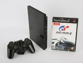 PlayStation 2 (PS2) Slim Console with Gran Turismo 4 (PAL) and 1 controller