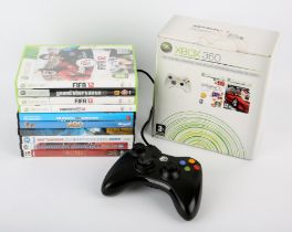 Microsoft gaming bundle (PAL) Includes: Xbox 360 controller (x1), Xbox 360 games (x4),