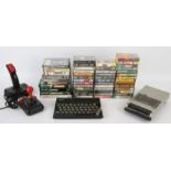 ZX Spectrum 48K with accessories, cables & 50+ games This lot also contains a Euromatic cassette