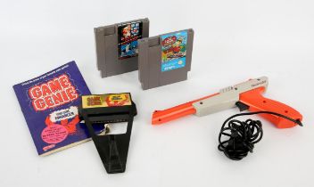 1985 Nintendo Zapper gun accessory + 2 games w/Game Genie accessory and booklet Games include: