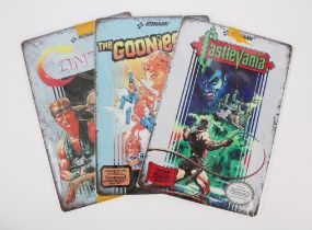 Metal posters for Konami games (x3) Including: Castlevania, The Goonies II and Contra