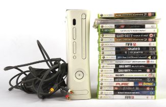 Xbox 360 gaming bundle (PAL) with 18 games Includes console and power plug Game highlights