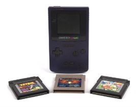 Nintendo Game Boy Colour handheld (Grape) with 3 loose cartridge games Games include: Cosmotank,