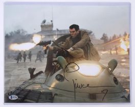 James Bond Die Another Day (2002) Colour photo signed by Pierce Brosnan, 12 x 16 inches.