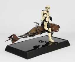A Gentle Giant Ltd painted composite scale model of a Star Wars scout trooper and speeder bike,