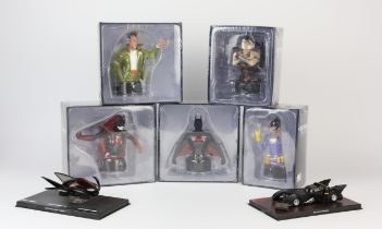 A collection of seven DC Comics Batman Universe Collectors busts and a small collection of Batman