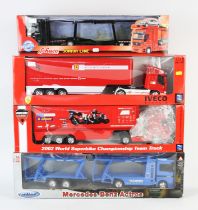 A Fastlane 1/32 scale die-cast DAF truck, boxed (x2), a Newray 1/32 scale 'Ferrari' die-cast Iveco