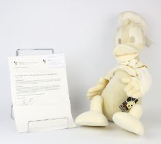 A Disney Plush Maqette of Donald Duck with storage bag and paper cutting pattern with accompanying