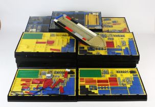 A quantity of Lego and Technics Lego packs, mostly contained in collectors trays or presentation