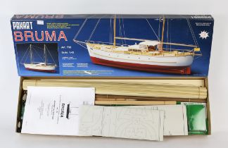 A Panart 1/43 scale wooden model boat 'Bruma', boxed kit and an Anglia models 1/24 scale wooden