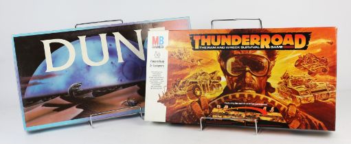 Two board games to include Dune by Parker Bros, 1984. And Thunder Road, MB Games (2 games).