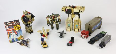 A collection of vintage Transformers by Hasbro and Takara, also including parts, accessories and