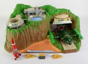 A Thunderbirds Tracy Island electronic playset, boxed and a Toy Story walkie talkie Buzz and Woody