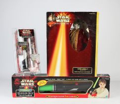 A quantity of Star Wars collectable merchandise including; a Hasbro Episode 1 electronic lightsaber,