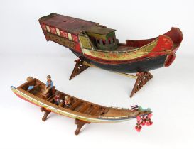 An early 20th century polychrome painted wooden scale model on a Chinese Junk, width 58cm,