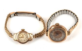 Ladies' 9 ct gold cased watch, with a gold and silver coloured unsigned dial with Arabic numerals,