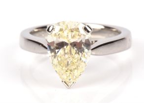 A single stone diamond ring, with an AnchorCert certificate stating natural pear cut diamond