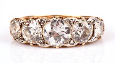 A Victorian five stone diamond ring, set with old cut diamonds, the central diamond weighing an