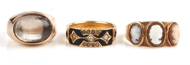 Three rings, including a mourning ring set with an old cut diamond, seed pearls, enamel and hair