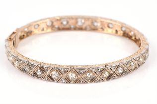 Old cut diamond set bangle, set with rows of old and rose cut diamonds around the whole bangle,