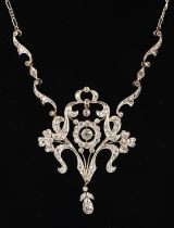 Edwardian old cut diamond pendant necklace in unmarked white metal, testing between 14 ct white