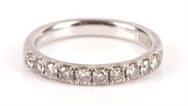 Diamond half eternity ring, set with round brilliant cut diamonds, estimated total diamond weight 0.