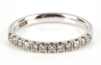 Diamond half eternity ring, set with round brilliant cut diamonds, estimated total diamond weight 0.
