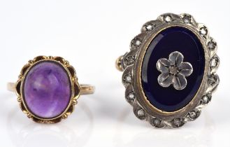 Two rings, including a single stone cabochon amethyst ring in 9 ct, size K½, and blue hard stone