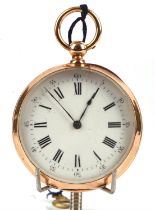 A gold open face pocket watch the unsigned white enamel dial with Roman numeral hour markers