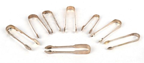 Collection of eight Georgian and Victorian sugar tongs, various dates and makers, 10oz 309gm