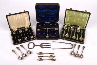 Cased set of four oval Victorian open salts with blue glass liners and four original salt spoons,