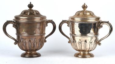 AMENDED WEIGHT Pair of large Edward VII two handled silver cups and covers by William Comyns & Sons