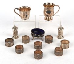 Set of six serviette rings, Birmingham 1900, two other serviette rings, pair of pepperettes