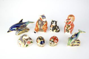 Royal Crown Derby, a Red Squirrel, gold stopper, a Honey Bear, silver stopper, a Lyme Bay Dolphin,