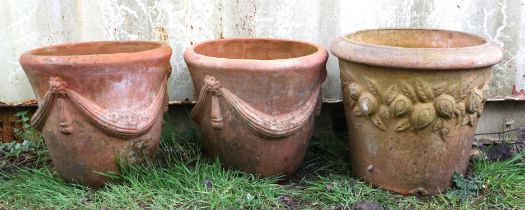 Pair of garden terracotta circular planters, decorated with swags in relief, 40 cm high,