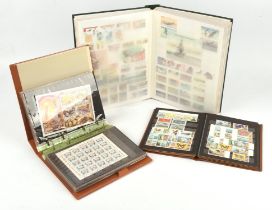 World stamps in three (3) stockbooks A-Z unmounted mint 1980s issues of commonwealth and world with